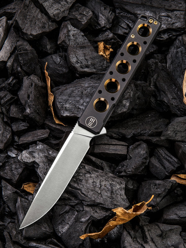 We Knife - 913A Miscreant Knife Black Ti Handle with Golden Ano Holes