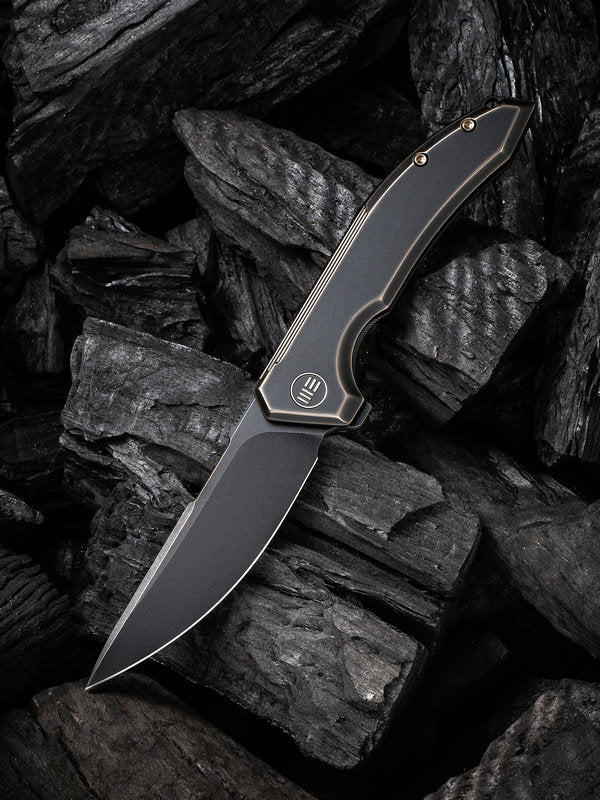 We Knife -21016-2 Quixotic Bronze/Black Titanium Handle Flipper with Black Stonewashed Blade